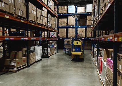 Lift truck operating in a logistics warehouse
