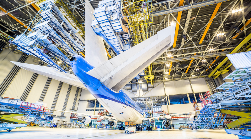 Airplane in warehouse being worked on to support Airbus production article