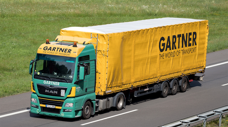 Gartner haulage truck driving down road to support labor shortages and strategy article