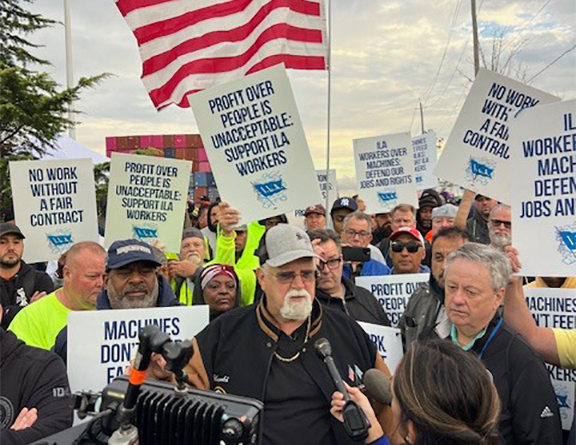 ILA strike members gathered with signs and flags to petition