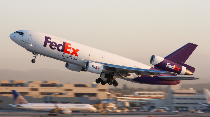 Fedex air freight plane taking off from runway