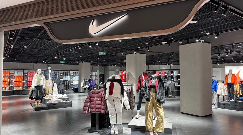 Nike factory workers producing sneakers in a Southeast Asian facility as part of global supply chain realignment to offset US tariffs.