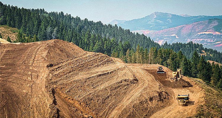 Itafos is demonstrating the benefits of integrated phosphate production in a strained market heavy earthmoving and grading equipment operating on a terraced slope