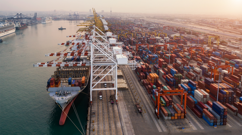 Ship for container with working crane bridge in shipyard for Logistic Import Export background