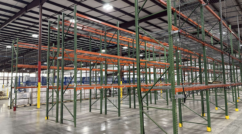 Industrial warehouse with tall pallet racking designed to maximise vertical storage space.